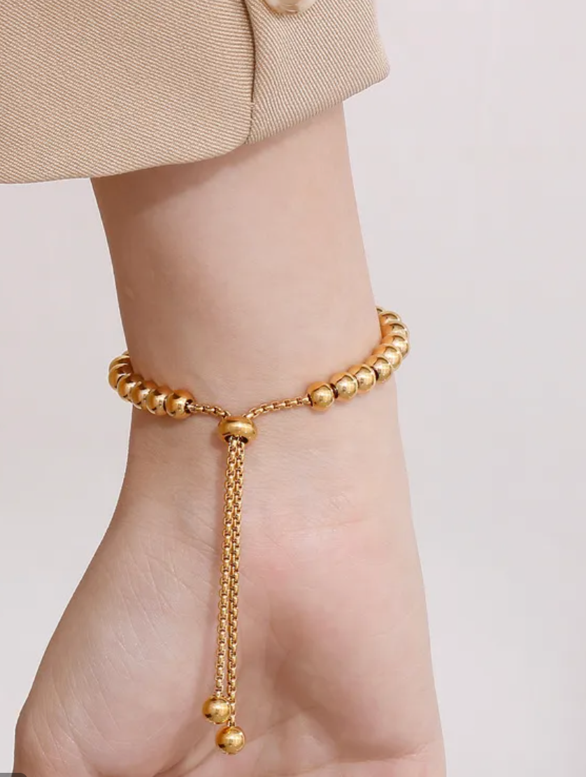 Charm bracelet coin